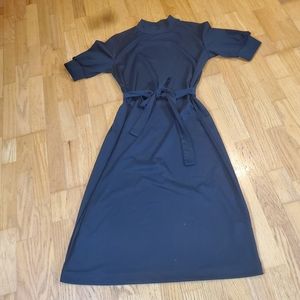 Mock turtle neck black dress.